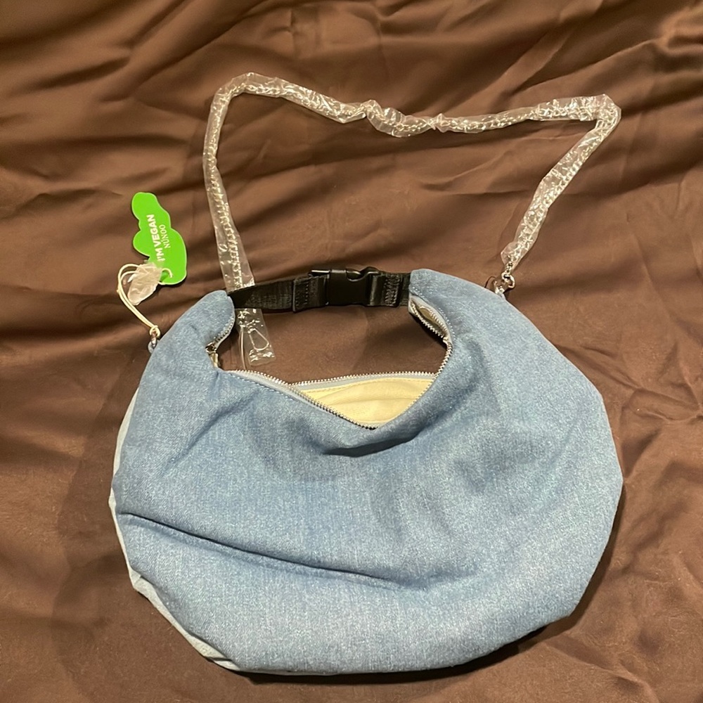 Nunoo studded denim 2 tone bag. Can be worn over the shoulder wrist or crossbody